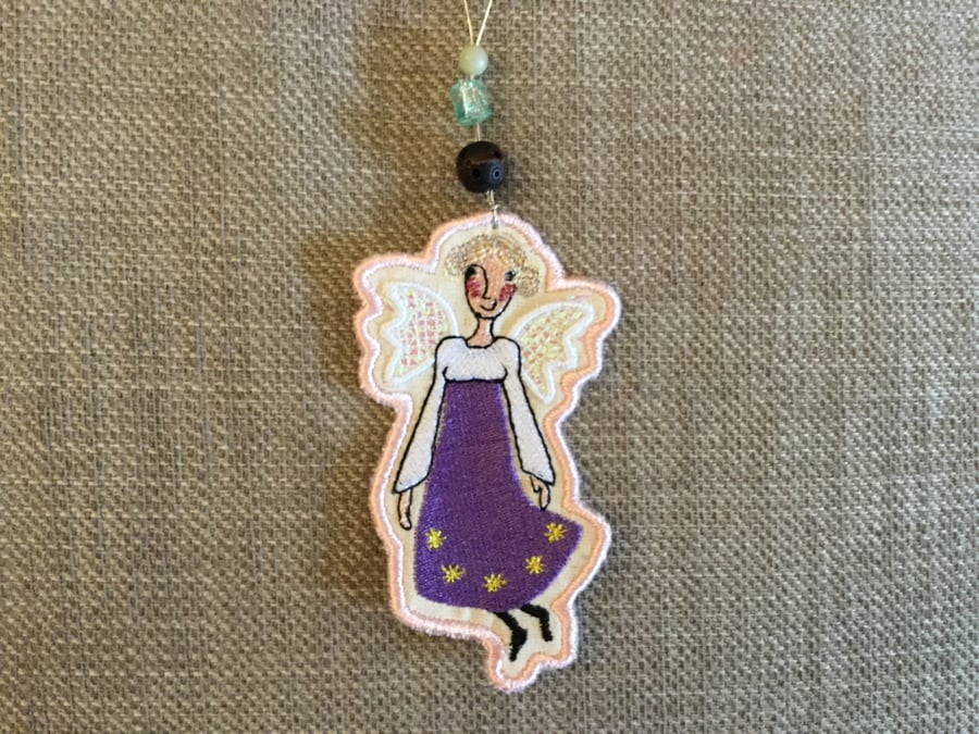 Hanging beaded angel decoration