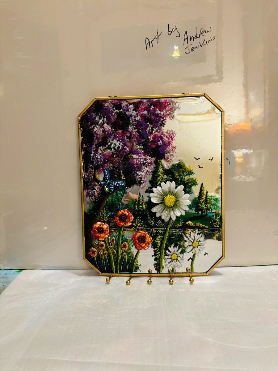 A hand painted mirror by Andrew Jenkins 