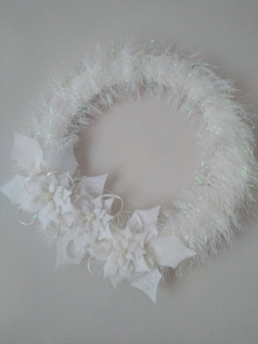 Silver and white poinsettia wreath