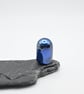 small metallic blue glass ghost