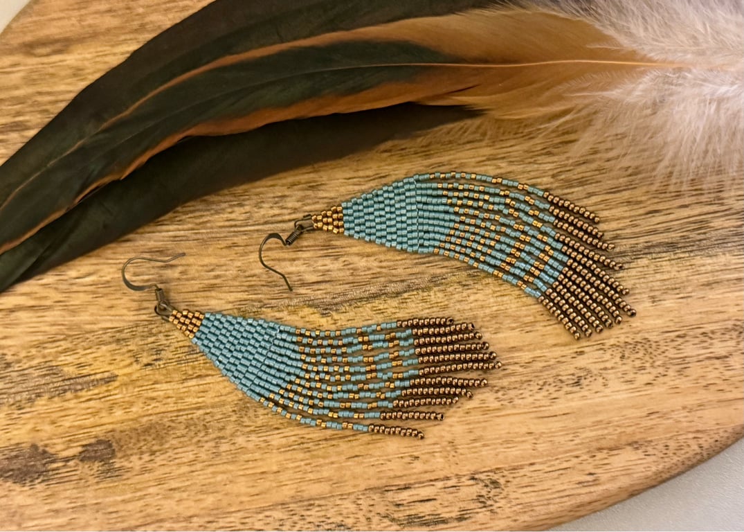 Long Native American style beaded fringe earrings in blue and bronze