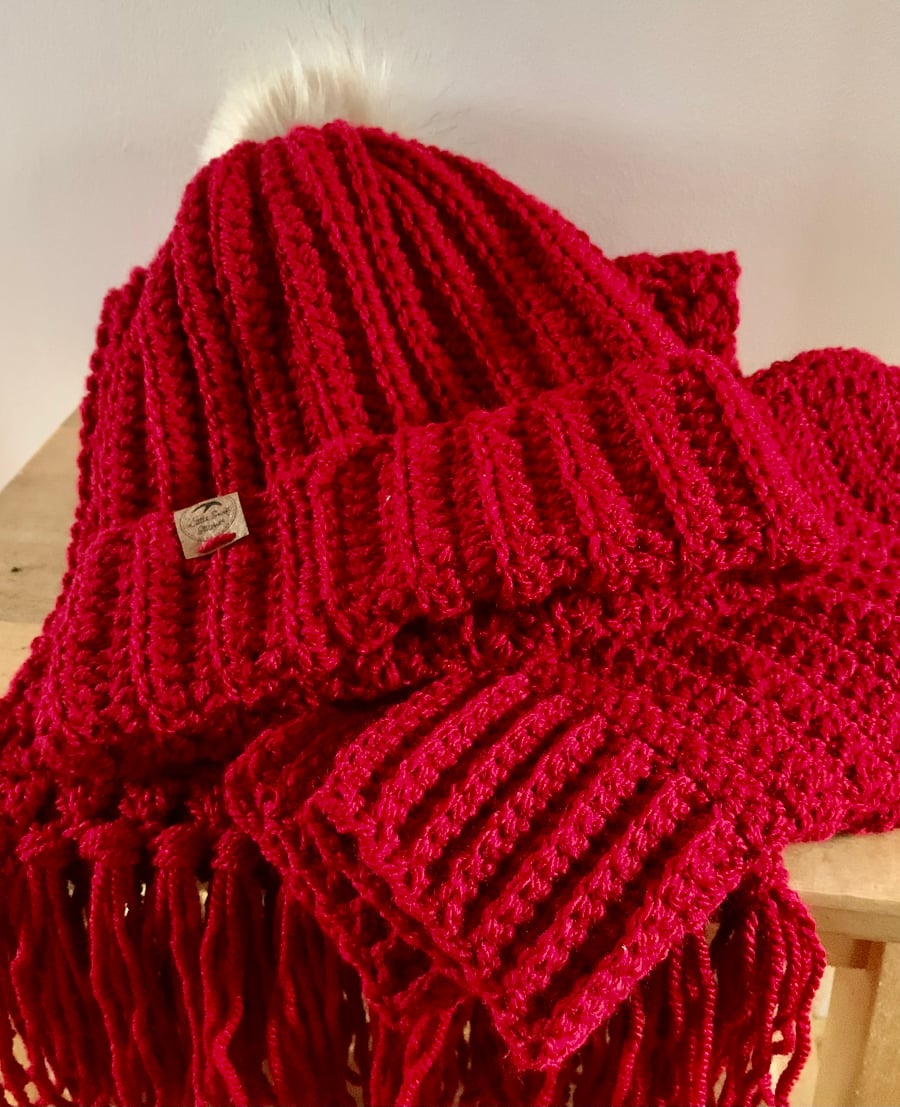 Crocheted hat, scarf and mitten set