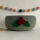 FELTED 'FUSSPOT'  BOWL ,desk tidy . Green ( with red rosebud corsage ) 