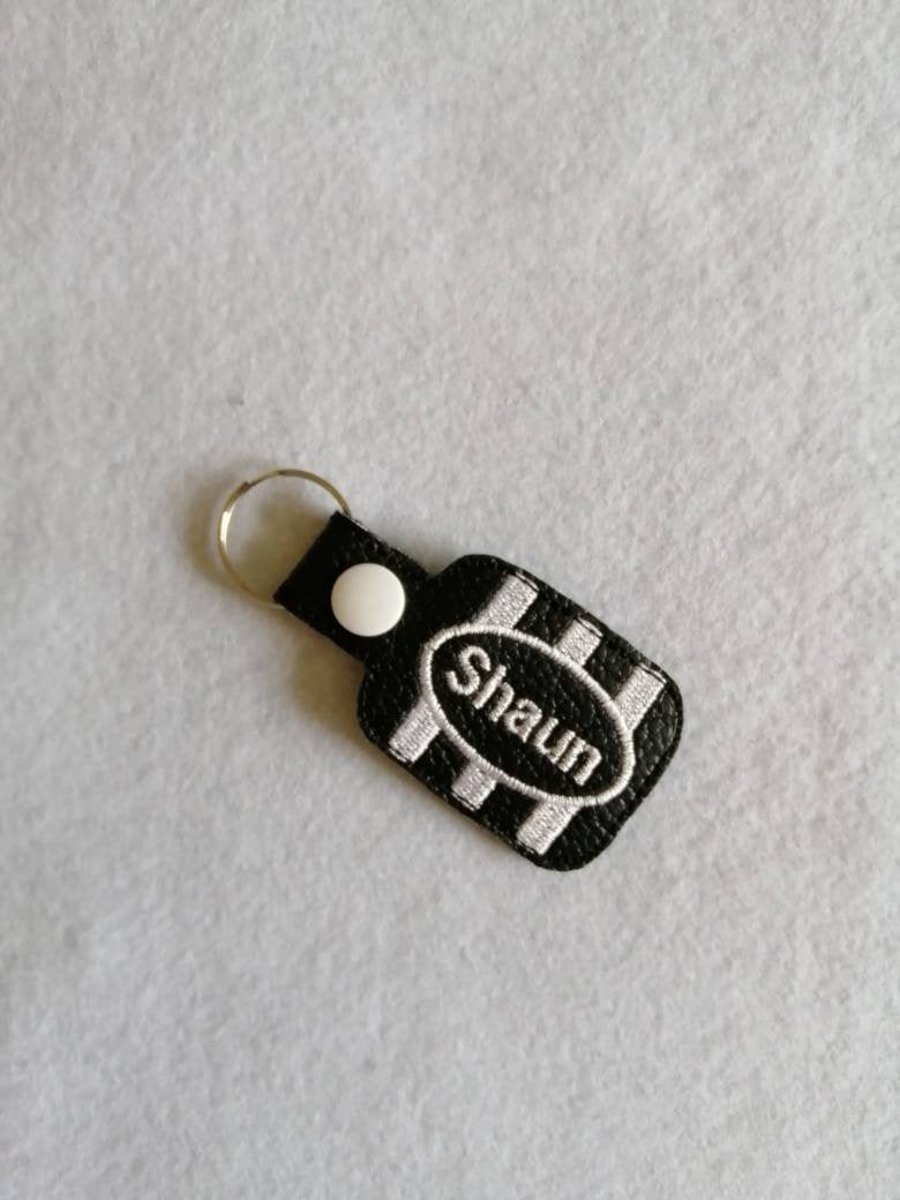 731. PERSONALISED striped keyring.