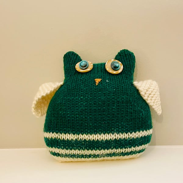 Knitted green owl with moving button eyes