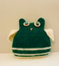 Knitted green owl with moving button eyes