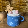 Gingerbread man in a mug standing decoration blue mug
