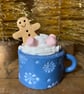 Gingerbread man in a mug standing decoration blue mug