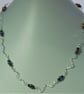Handcrafted wavy necklace with Hematite rainbow beads - Image 5