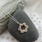 Silver flower pendant