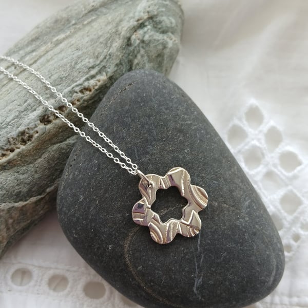 Silver flower pendant