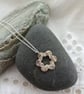 Silver flower pendant