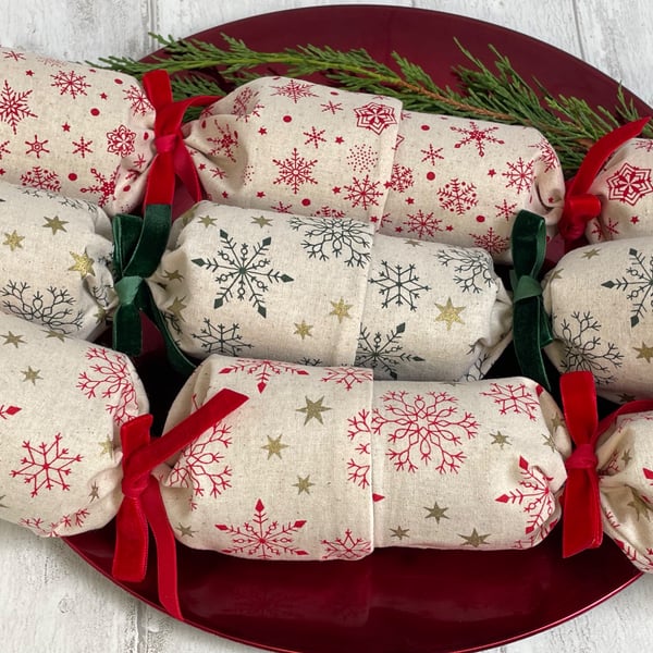 Set of three Christmas crackers. Scandi-style snowflakes with velvet ribbons