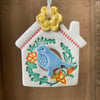 Small Ceramic bird house decoration with yellow flower