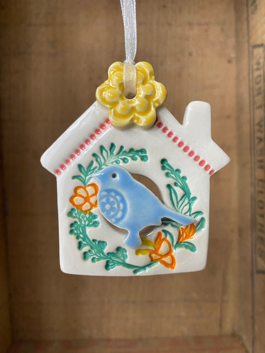 Small Ceramic bird house decoration with yellow flower