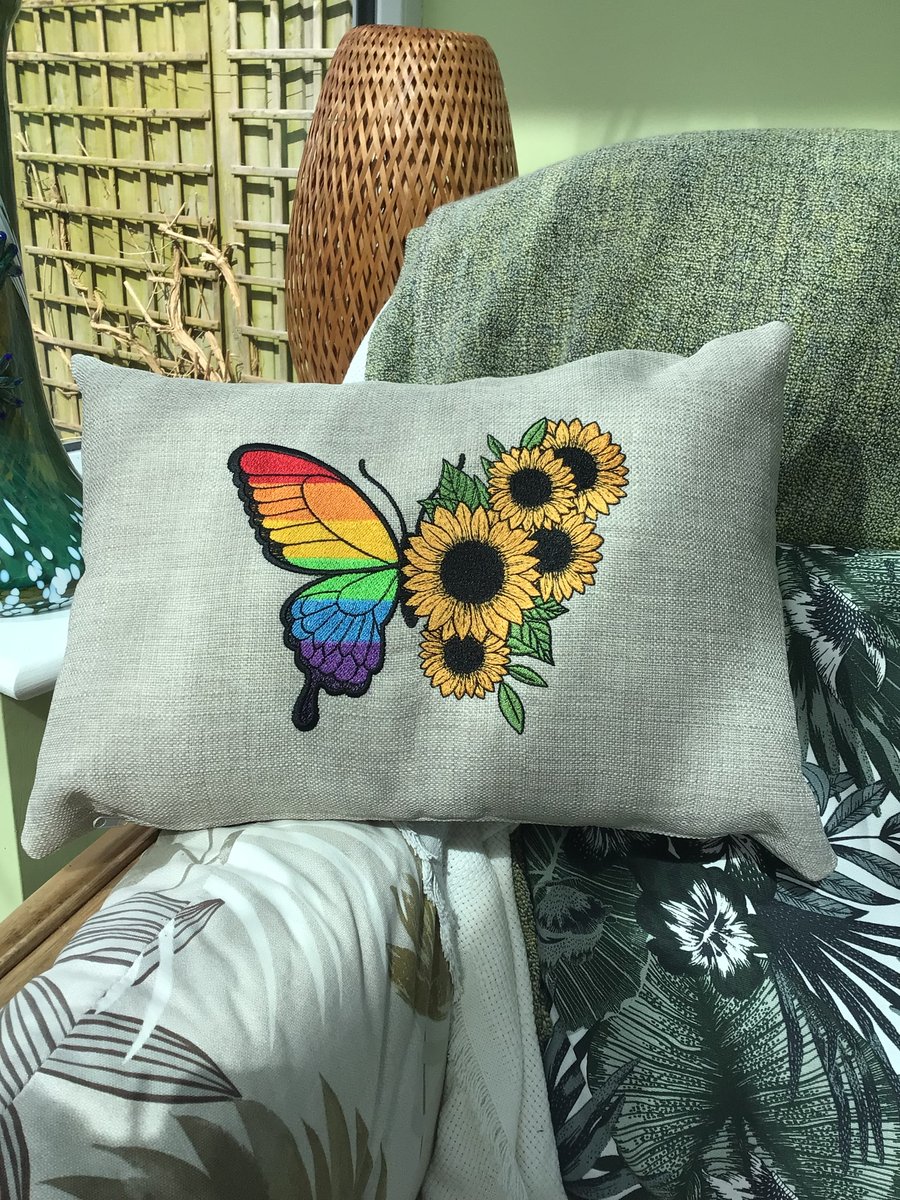 Oblong embroidered cushion, rainbow Butterfly and sunflowers.