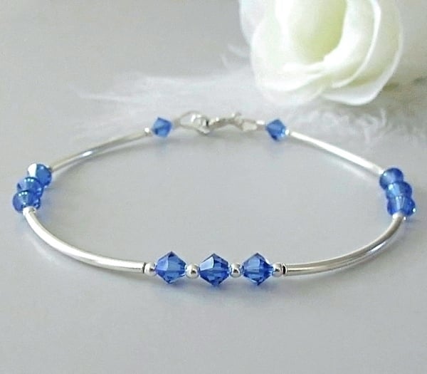 Sapphire Blue Premium Crystals & Sterling Silver Curves Designer Bracelet