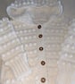 White hooded cardigan handmade for a small girl ages around 2.5 years old 
