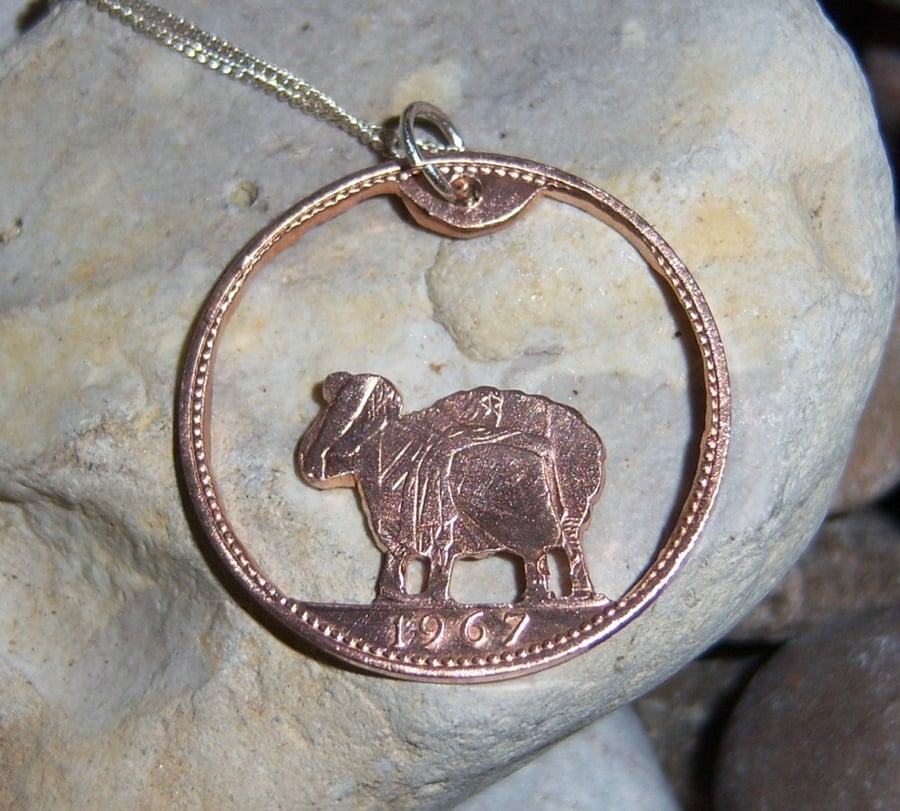Sheep pendant cut from bronze penny coin
