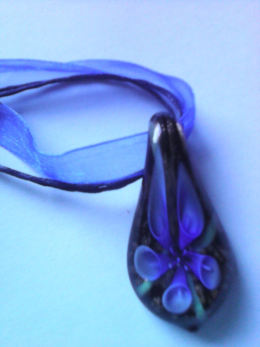 An Unusual Blue 3D Flower Glass Pendant