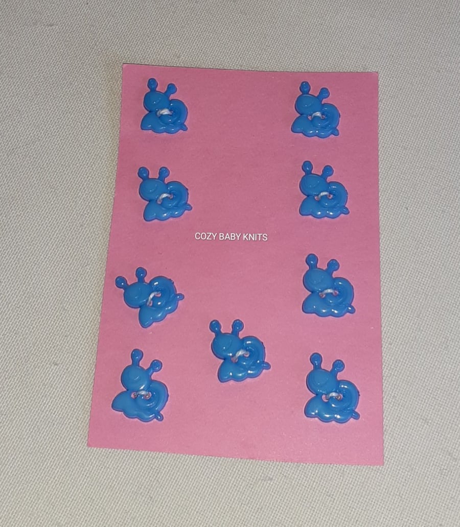 MID BLUE SNAIL SHAPE BUTTONS WITH TWO HOLES FOR ATTACHING 