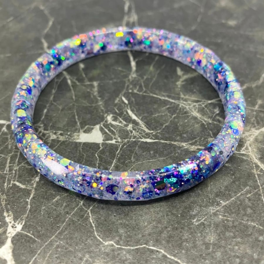 Blue glitter sparkly bangle in resin.