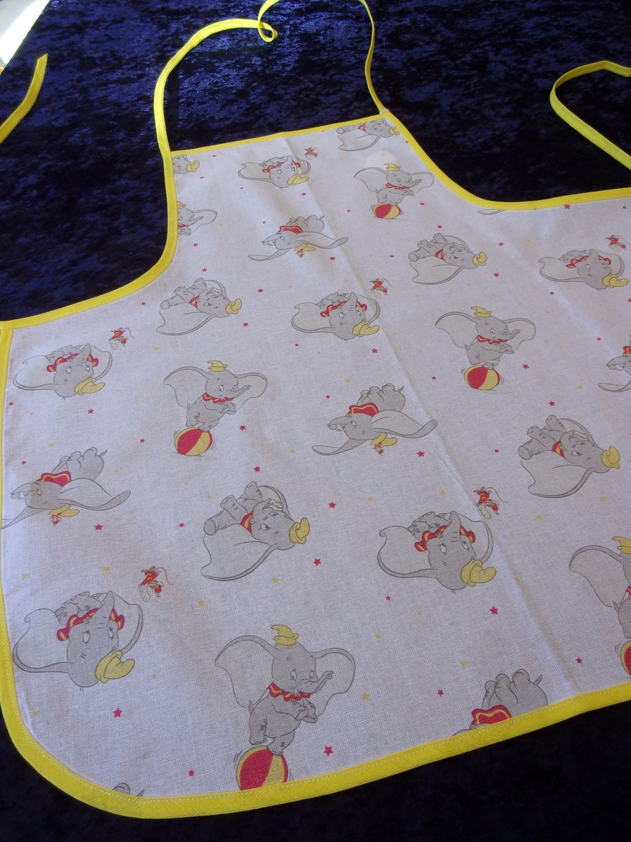 Baby Apron with Dumbo on a White Background