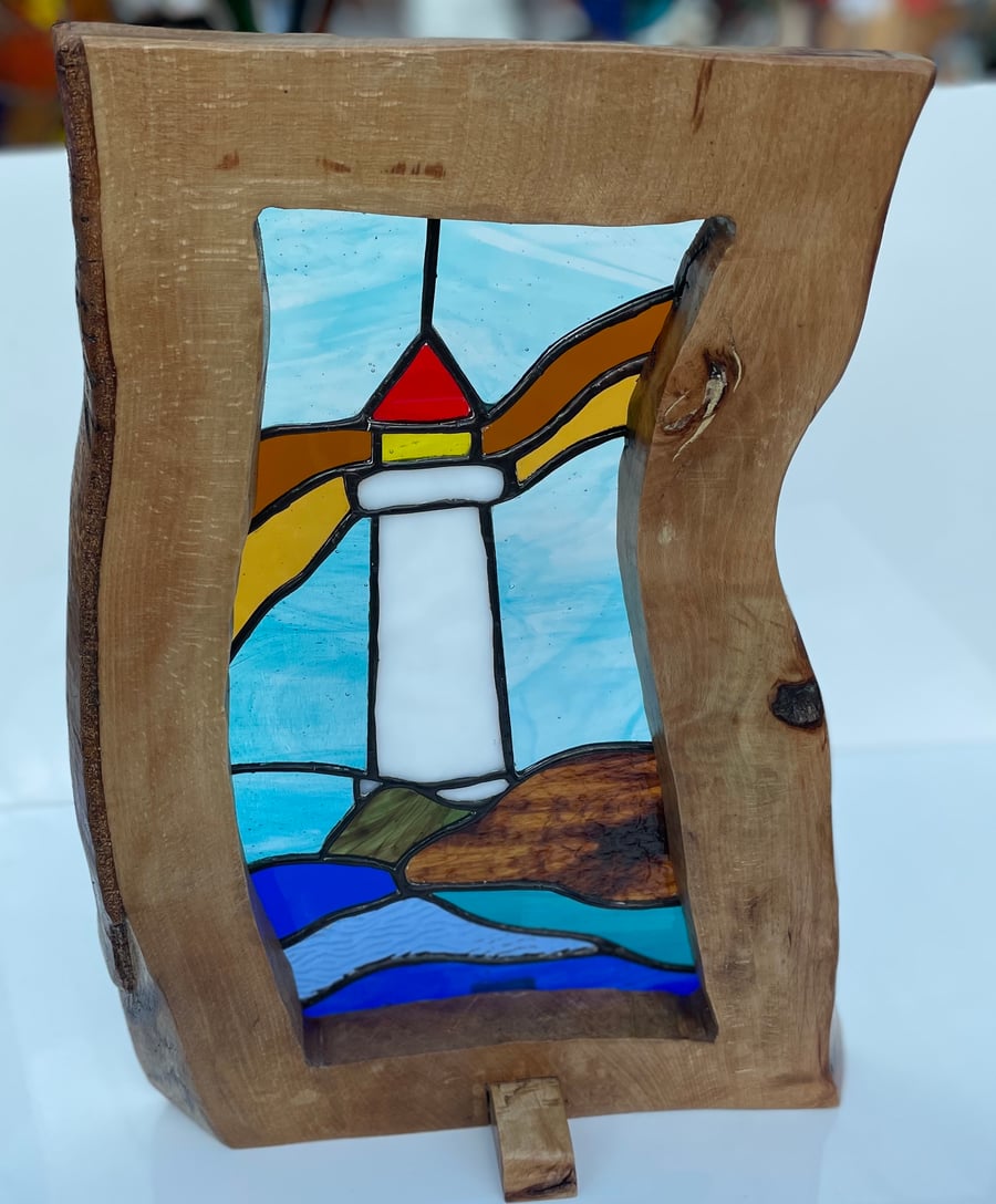 Stained glass lighthouse in ethically sourced wood frame with live edge unique