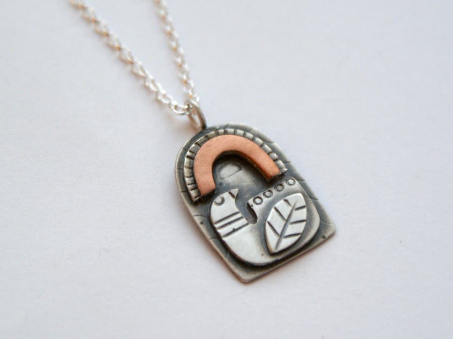 Small rainbow bird folk pendant