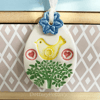 Pottery Easter Egg decoration with yellow bird and flower