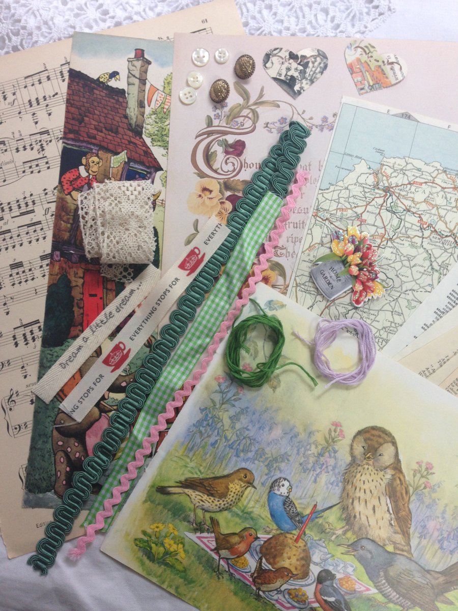 Scrap booking kit using vintage pages ribbon lace buttons and thread 
