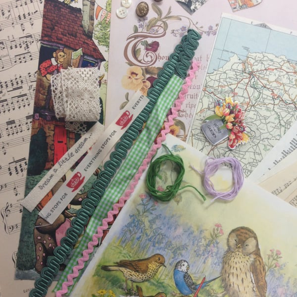 Scrap booking kit using vintage pages ribbon lace buttons and thread 