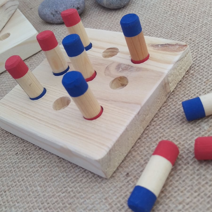 Handmade wooden noughts and crosses, tic tac toe style game with storage bag