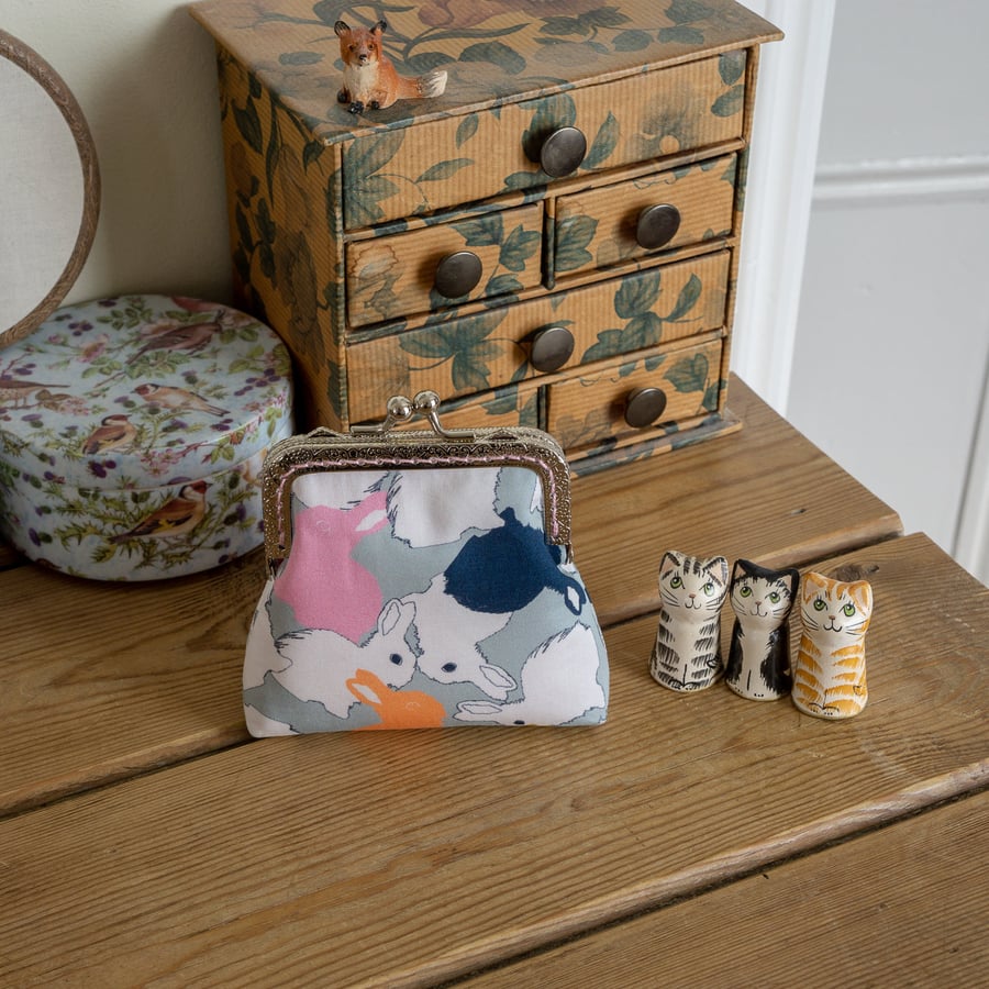 Coin purse made with colourful bunnies print on fine cotton lawn and pink lining