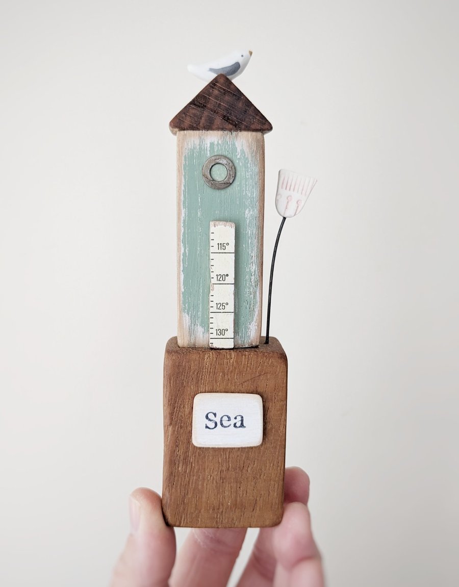 Tall Wooden Sea Hut with Clay Flower and Seagull 'Sea'