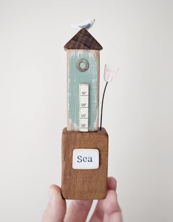 Tall Wooden Sea Hut with Clay Flower and Seagull 'Sea'