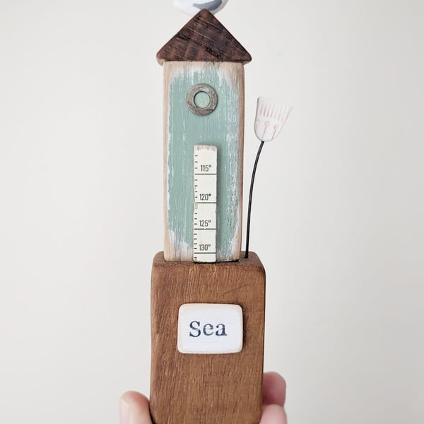 Tall Wooden Sea Hut with Clay Flower and Seagull 'Sea'