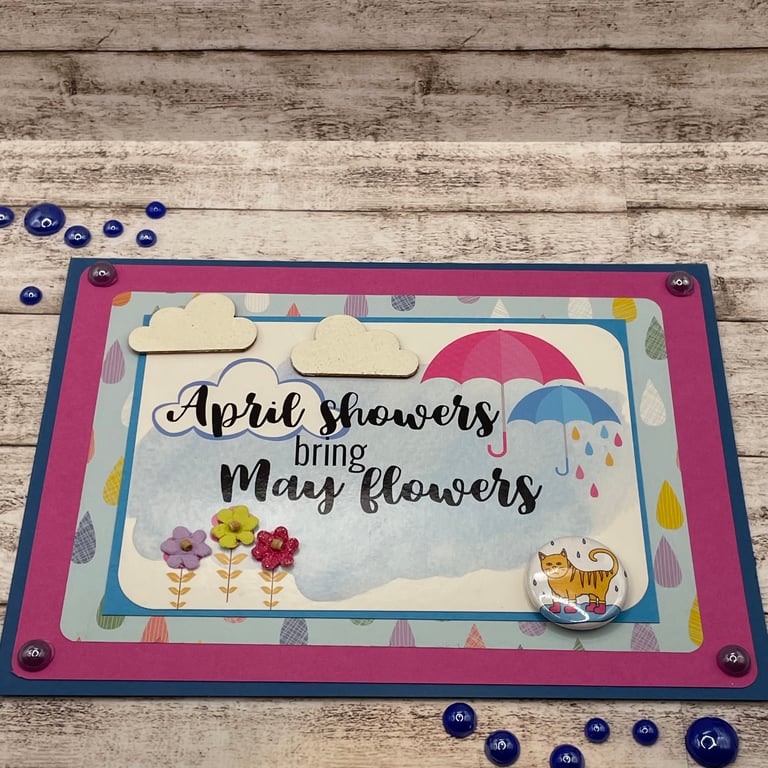 April showers and flowers card with a cute cat enjoying the rain