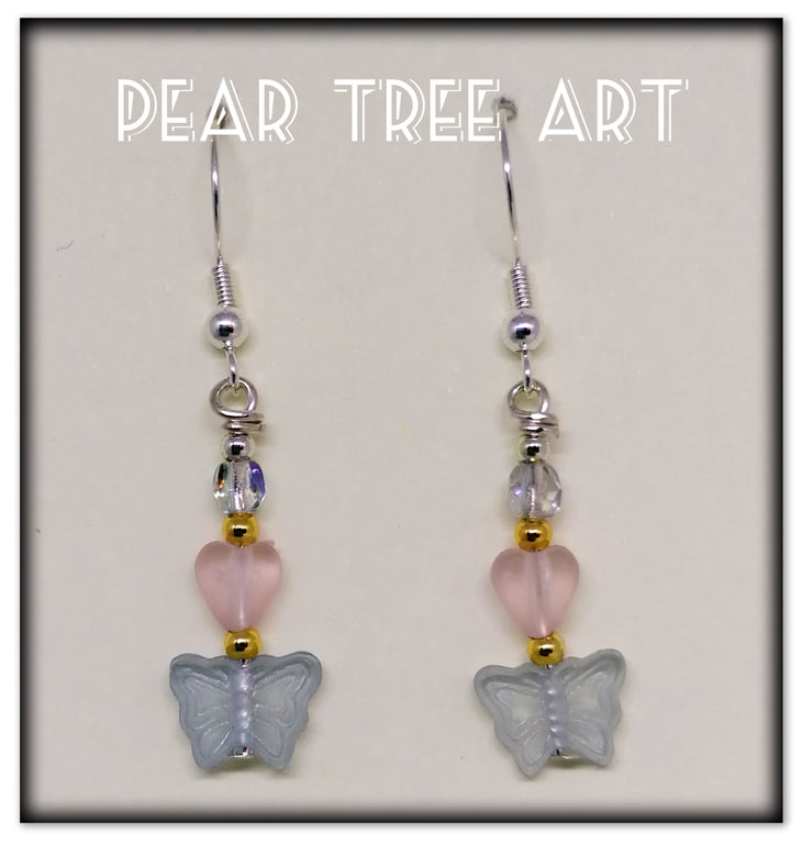 Small heart and butterfly bead earrings on Silver  plated hooks.