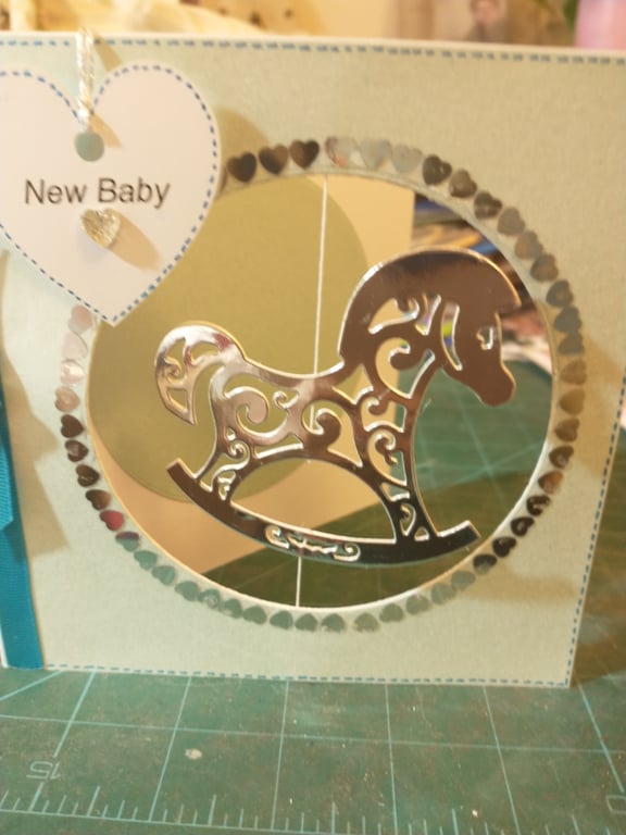 Blue new baby boy rocking horse card