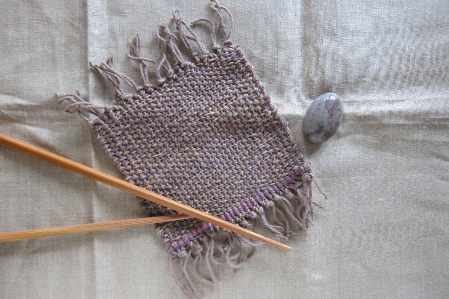 hand woven wool coaster in lilac