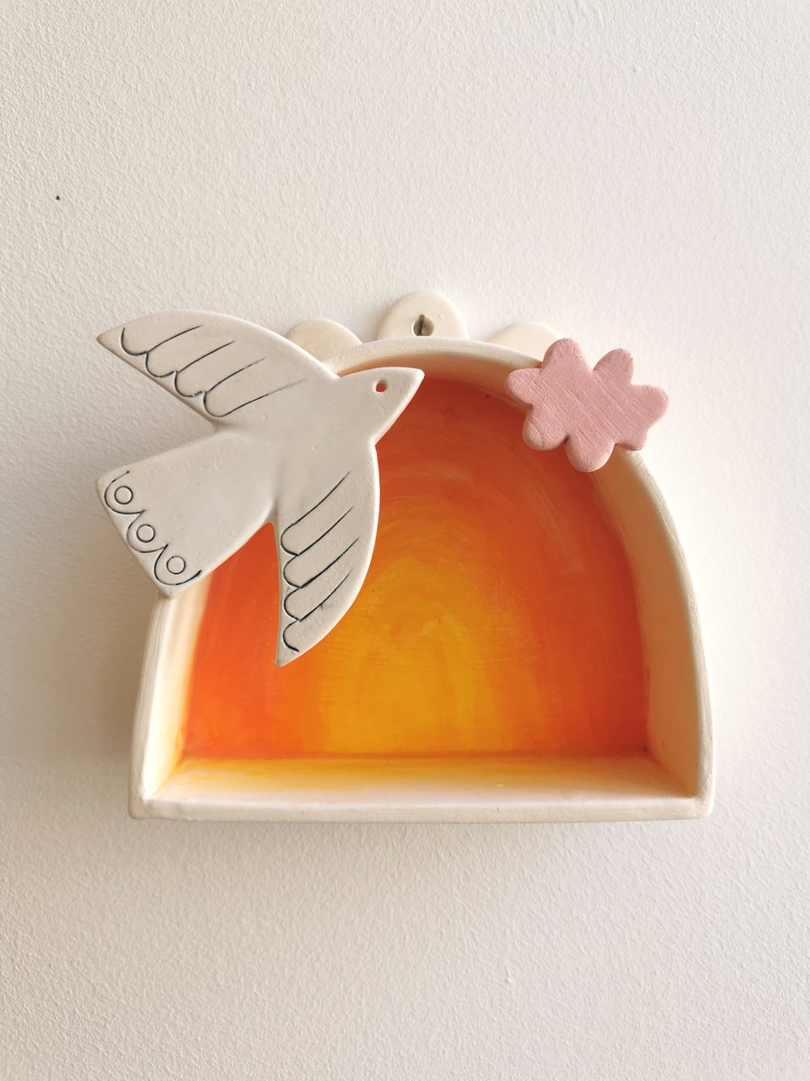 Ceramic wall shrine with dove and cloud