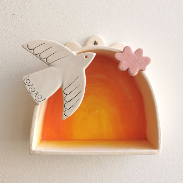 Ceramic wall shrine with dove and cloud