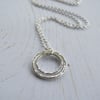 Double hoop pendant in recycled silver