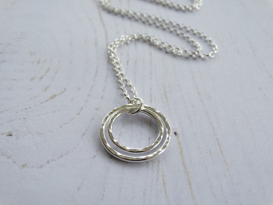 Double hoop pendant in recycled silver