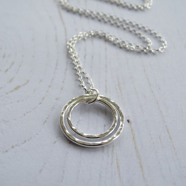 Double hoop pendant in recycled silver