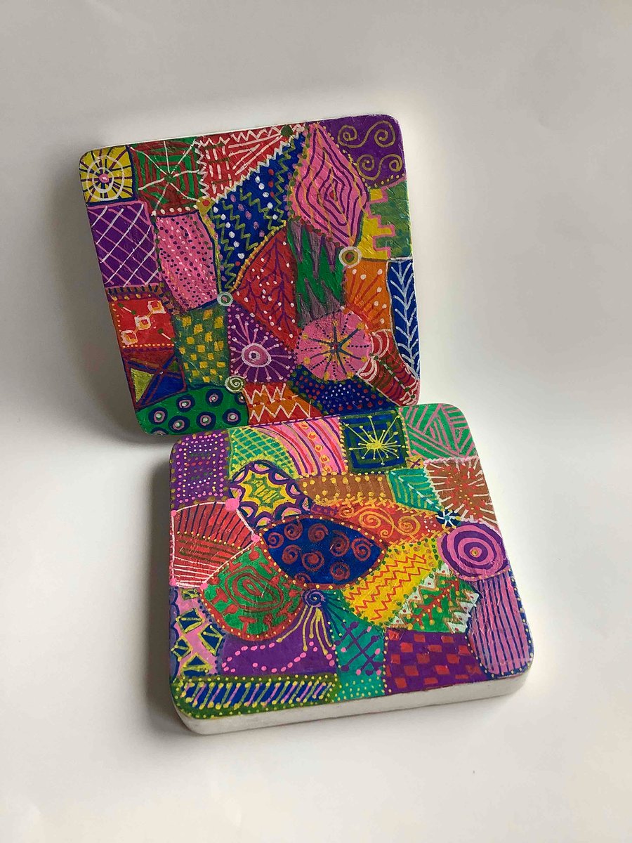 2 quirky hand painted wooden coasters 