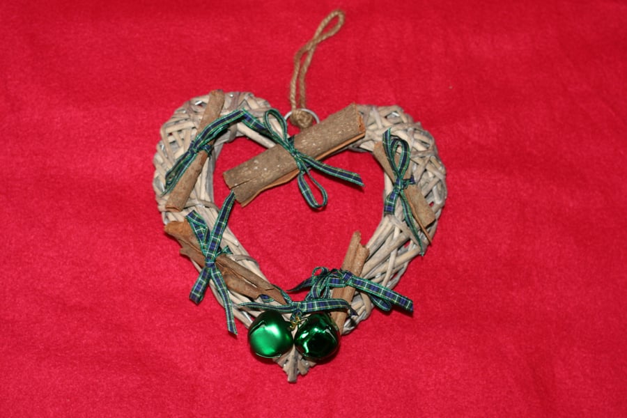 Cinnamon stick and tartan bow heart shaped Christmas wreath
