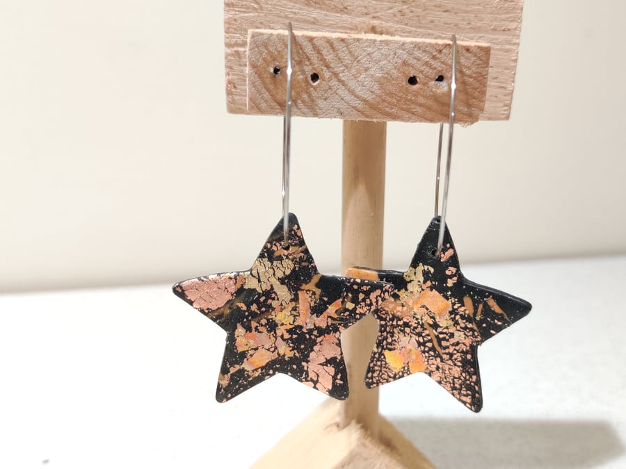 Black gold star hoop earrings