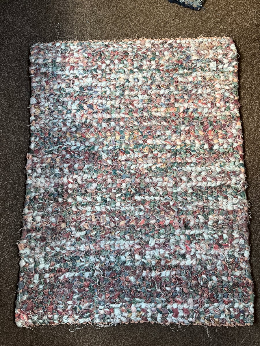 Rustic dusty coral rag rug